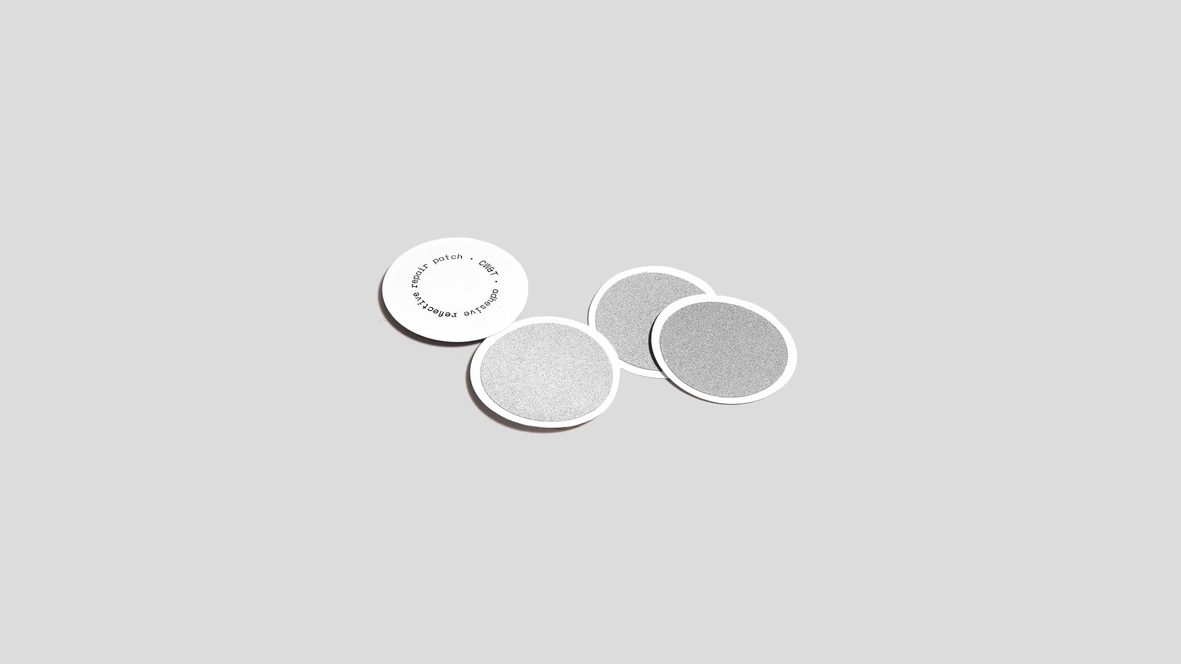 Adhesive reflective repair patch